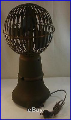 Antique Vertical Bankers Fan Cast Iron Base Brass Spherical Cage Electric Fan